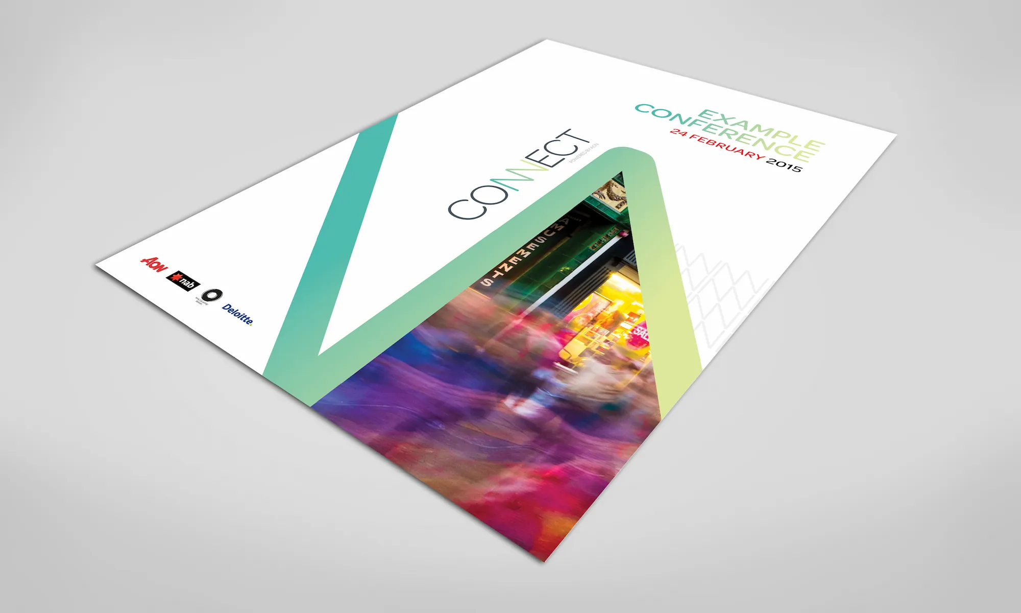An angled view of a conference program cover design titled "Connect Powered by Aon," featuring a stylized triangular cutout revealing a blurred city night scene.