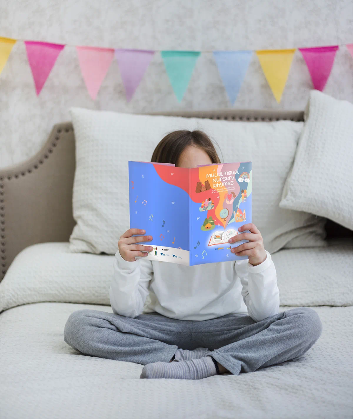 Multilingual nursery rhyme booklets for culturally diverse communities, featuring custom illustrations of animals and nursery rhymes in multiple languages