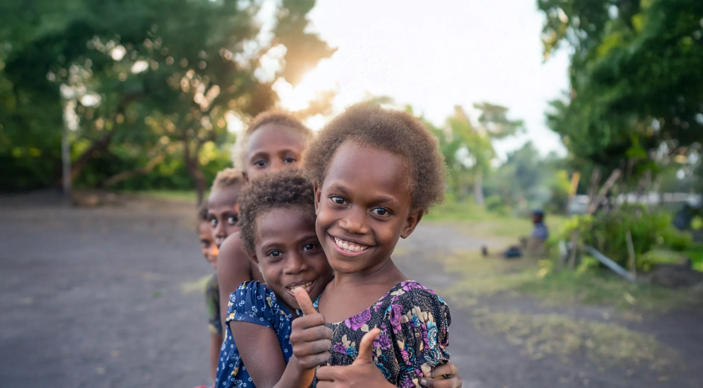 A close up group photo of smiling children in Papua New Guinea